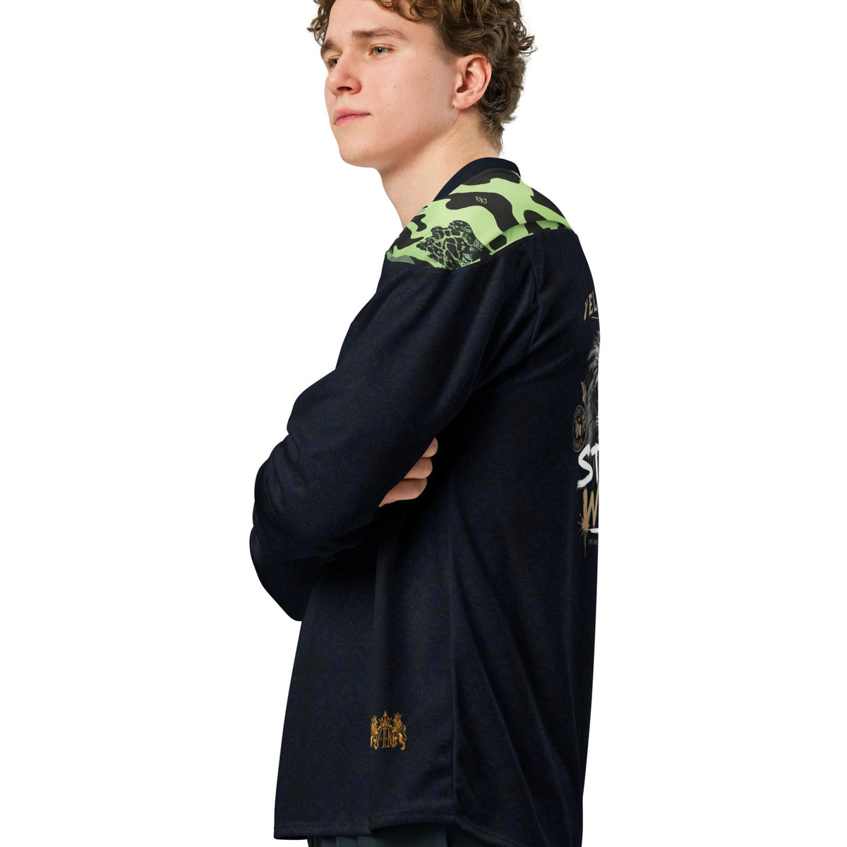 Velvet Ink Market Black & Green Camo Hockey Fan Jersey, left view featuring green camouflage panels and a gold lion crest.