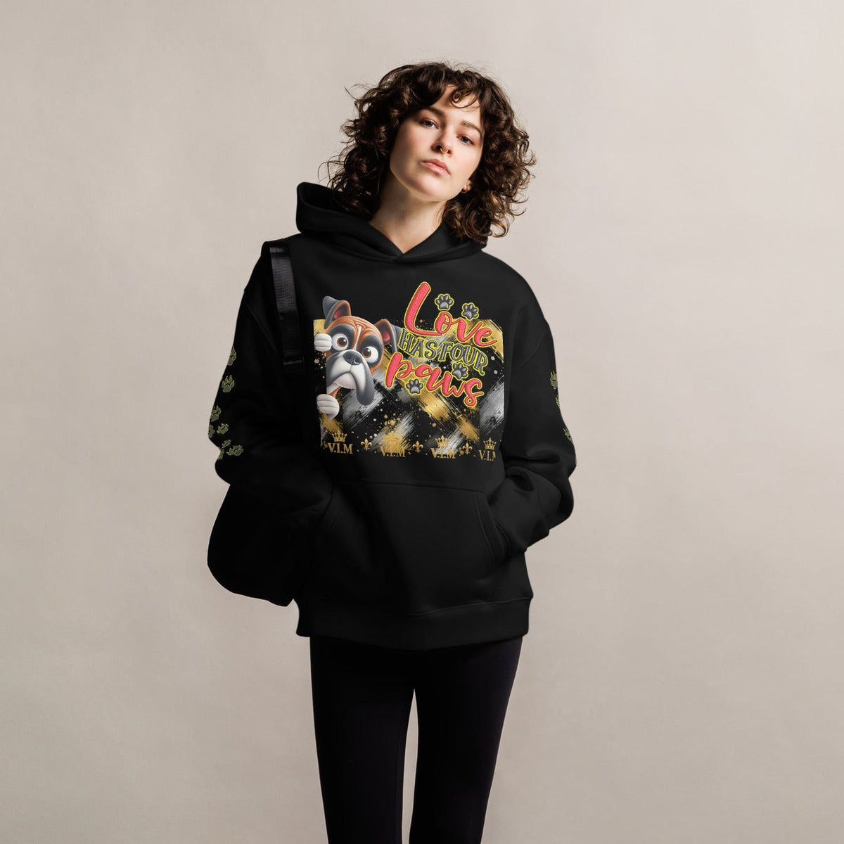 Front view of V.I.M Loyal Companion black oversized hoodie with dog illustration and pink lettering