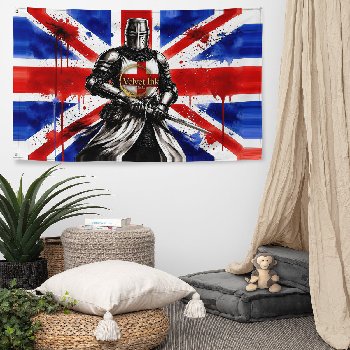Union Jack Templar-inspired knight wall flag hanging above woven cushions and a plant in a neutral room.
