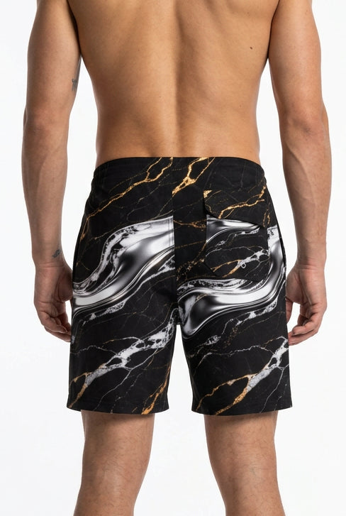 Back view of V.I.M Shadow & Gold Marble Board Shorts showing black marble-inspired print