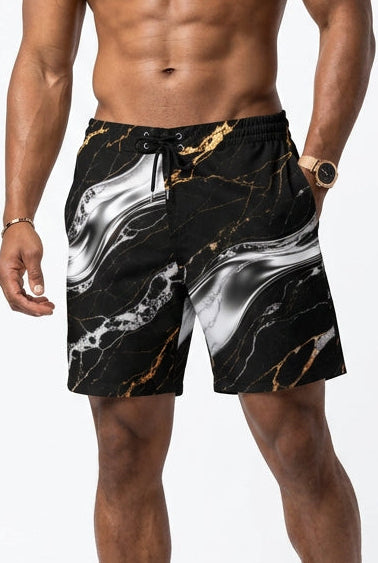 Front view of V.I.M Shadow & Gold Marble Board Shorts with white marble swirls and gold-toned veins on black