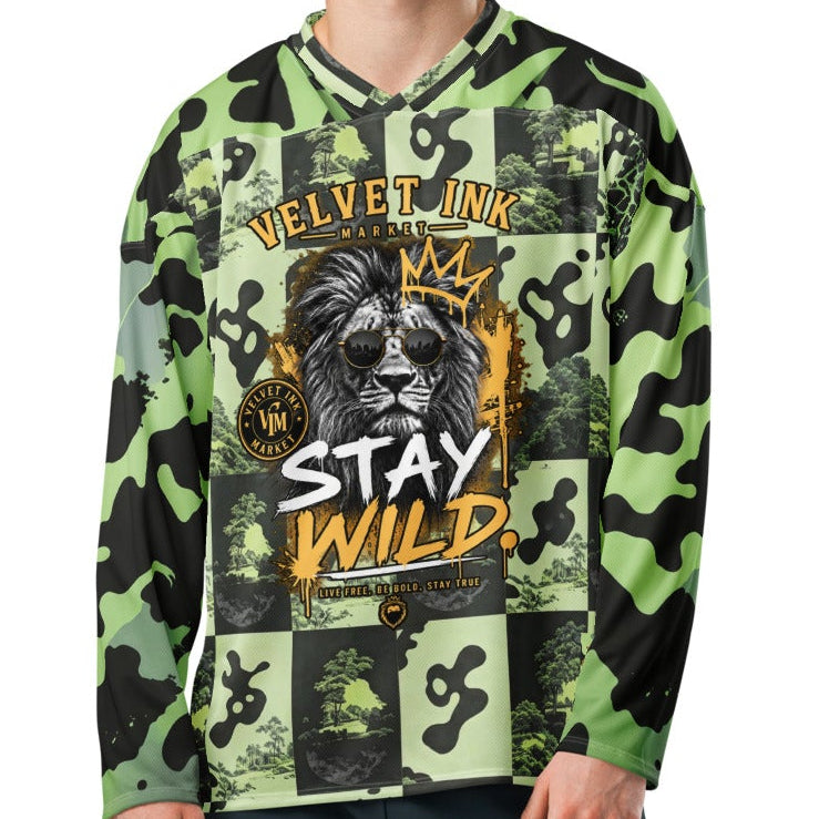 Velvet Ink Market Stay Wild Lion Green Camo Hockey Fan Jersey, front view featuring a crowned lion with sunglasses on green camouflage (additional photo 2).