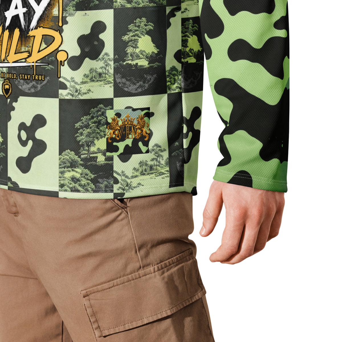 Velvet Ink Market Stay Wild Lion Green Camo Hockey Fan Jersey, close-up product detail featuring a crowned lion with sunglasses on green camouflage.