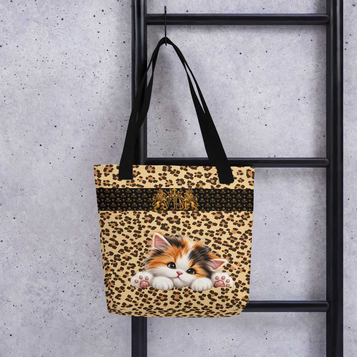 V.I.M kitten leopard-print tote bag hanging from a rail