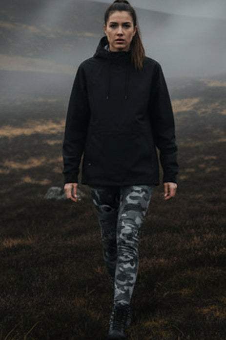 Kids leggings with four-way stretch and UPF 50+ protection in obsidian shadow color for active outdoor play