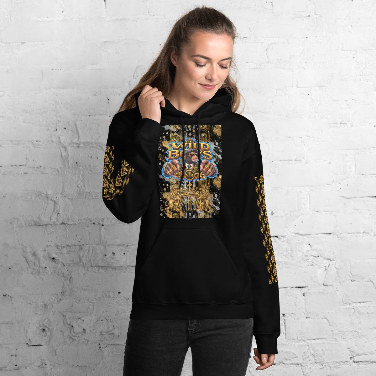 Black Wild Boys Primate hoodie with gold and multicolour chest print, woman modelling front view against a white wall