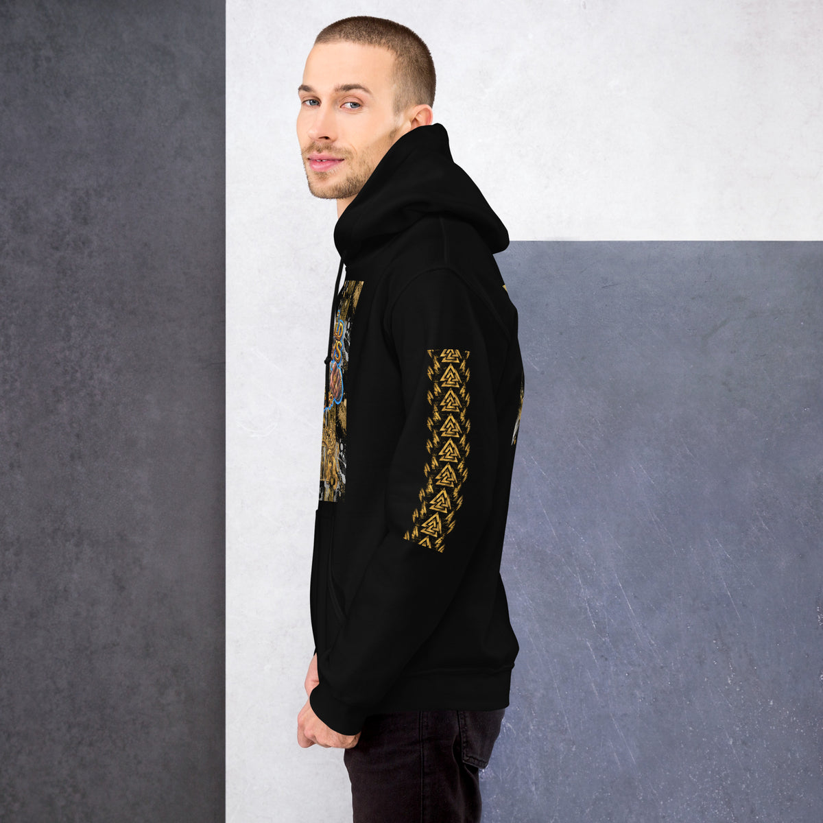 Black Wild Boys Primate hoodie with gold patterned sleeve and chest artwork, model left-side view