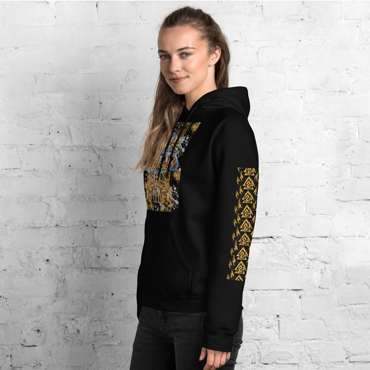 Black Wild Boys Primate hoodie with gold sleeve motifs and chest artwork, woman modelling a front-left view