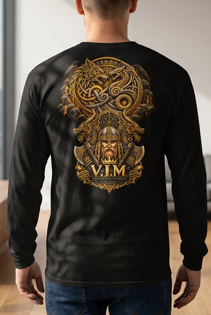 A man viewed from the back wearing a black long-sleeve t-shirt with a large, detailed gold and bronze Viking-themed graphic on the back, paired with blue jeans against a plain white background.