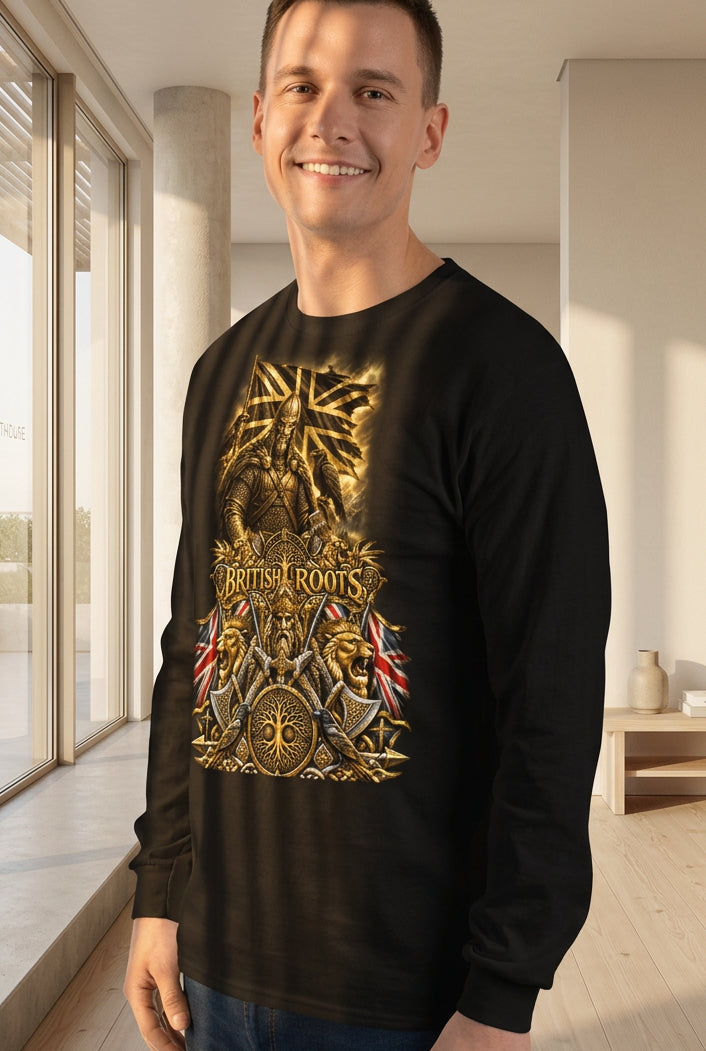 A man wearing a black long-sleeve t-shirt with a large gold and brown graphic on the front that reads 'British Roots', paired with blue jeans, against a plain white background.